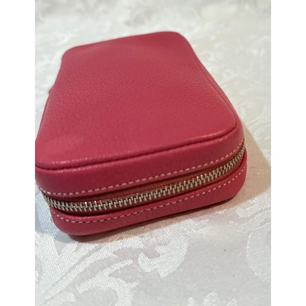 Coach hot pink zip wallet suede-lined multiple zipper compartments. 6